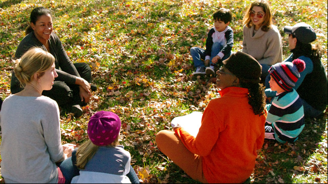 Educator talks with group