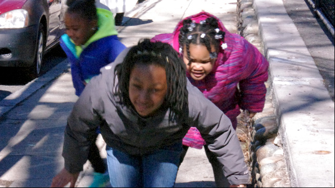 Three girls continue to dodge sun